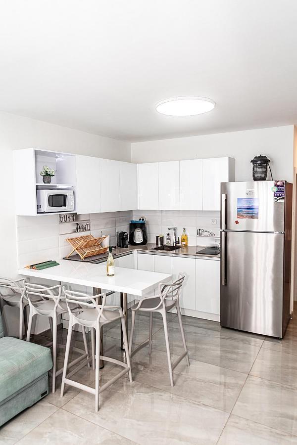 דירת גן פונה לבריכה - Pool Garden View Eilat Apartment ภายนอก รูปภาพ